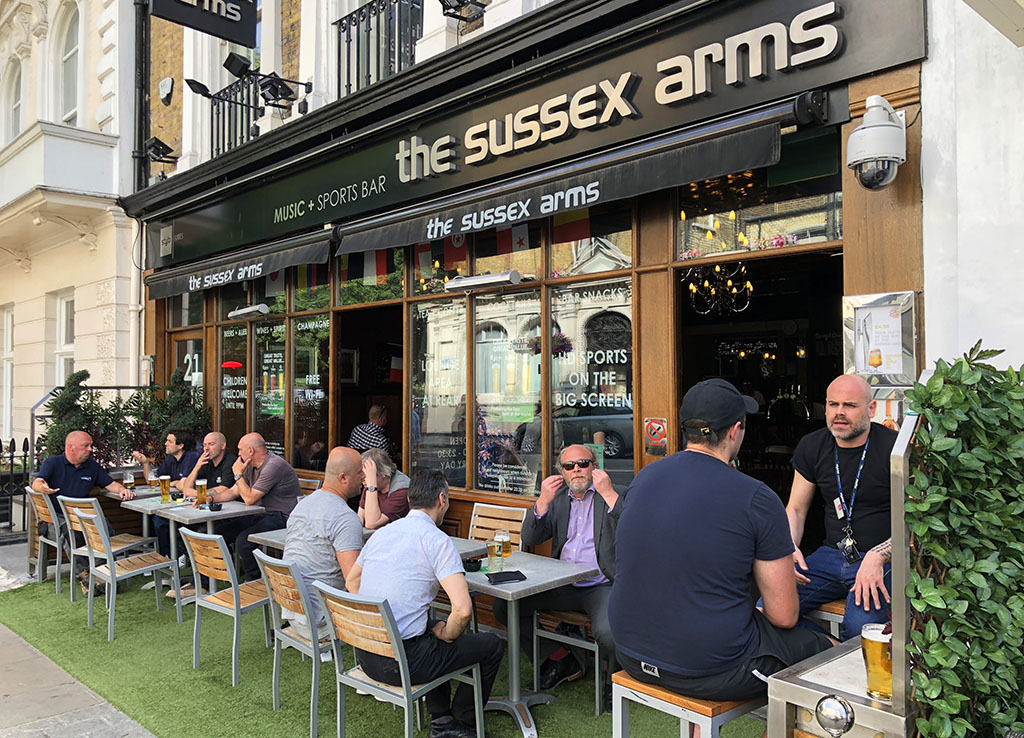 best-place-to-stay-in-london-pub-patrons-outside-the-sussex-arms-pub-in-paddington